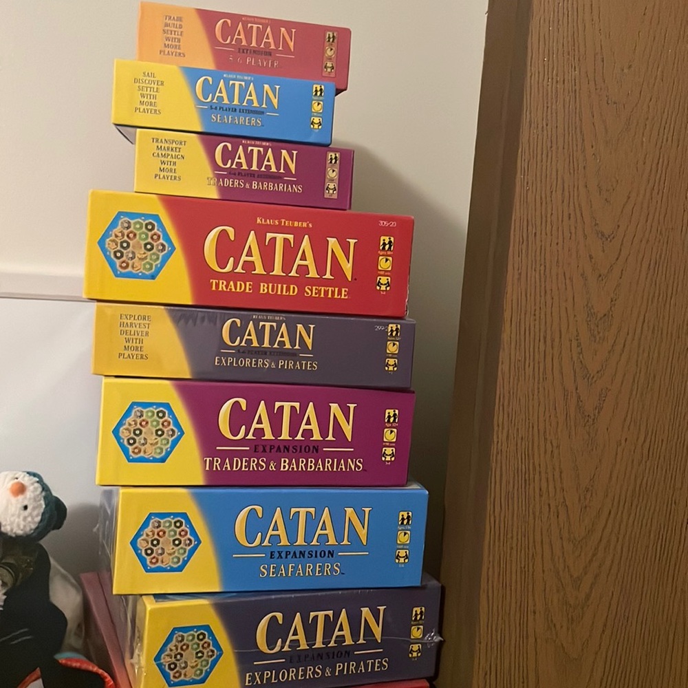 Four catan games with extensions